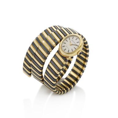 View full screen - View 1 of Lot 127. Reference 240 | A yellow and blackened gold bracelet watch | Circa 1975.