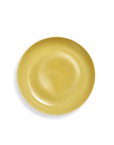 View full screen - View 1 of Lot 802. A yellow-glazed dish, Mark and period of Hongzhi | 明弘治 黃釉盤 《大明弘治年製》款.