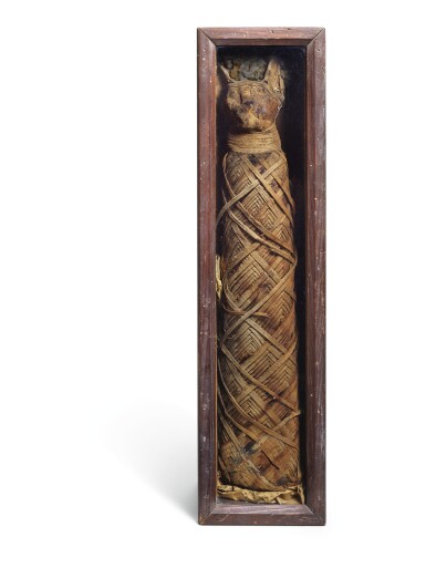 View full screen - View 1 of Lot 183. AN EGYPTIAN MUMMIFIED CAT, PROBABLY ROMAN PERIOD.