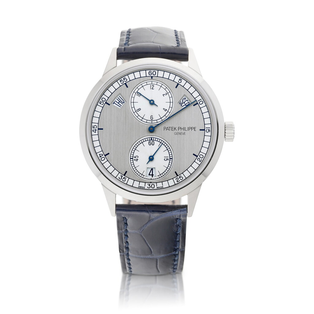 View full screen - View 1 of Lot 2190. Reference 5235 | A white gold annual calendar wristwatch with day, date and regulator dial, Circa 2014 | 百達翡麗 | 型號5235 | 白金年曆腕錶,備日期、星期顯示及三針一線錶盤,約2014年製.