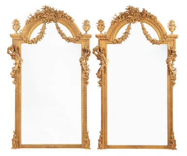 View full screen - View 1 of Lot 63. A pair of Louis XVI style carved and giltwood mirrors .