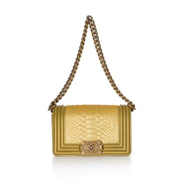 View full screen - View 1 of Lot 27. CHANEL | GOLD COLOUR CROSSBODY BOY BAG IN PYTHON LEATHER WITH GOLD HARDWARE, 2019 .