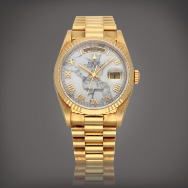 View full screen - View 1 of Lot 31. Day-Date, Reference 18238 A yellow gold wristwatch with day, date, bracelet and marble dial Circa 1995 | 勞力士 | Day-Date 型號 18238 黃金鍊帶腕錶備星期及日期顯示,配大理石錶盤,製作年份約 1995.