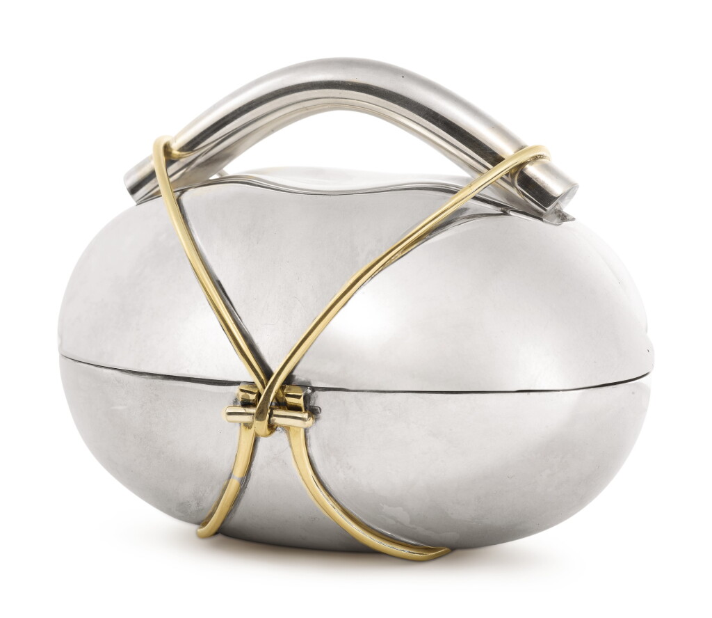 View full screen - View 1 of Lot 130. AN ISRAELI PARCEL-GILT SILVER ETROG BOX, ARIE OFIR, JERUSALEM, CIRCA 1985.
