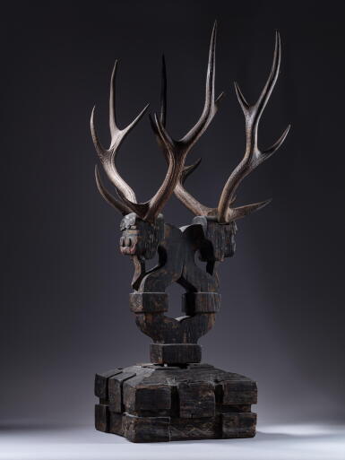 View full screen - View 1 of Lot 246. A lacquer wood and deer antler 'Zhenmushou' tomb guardian.