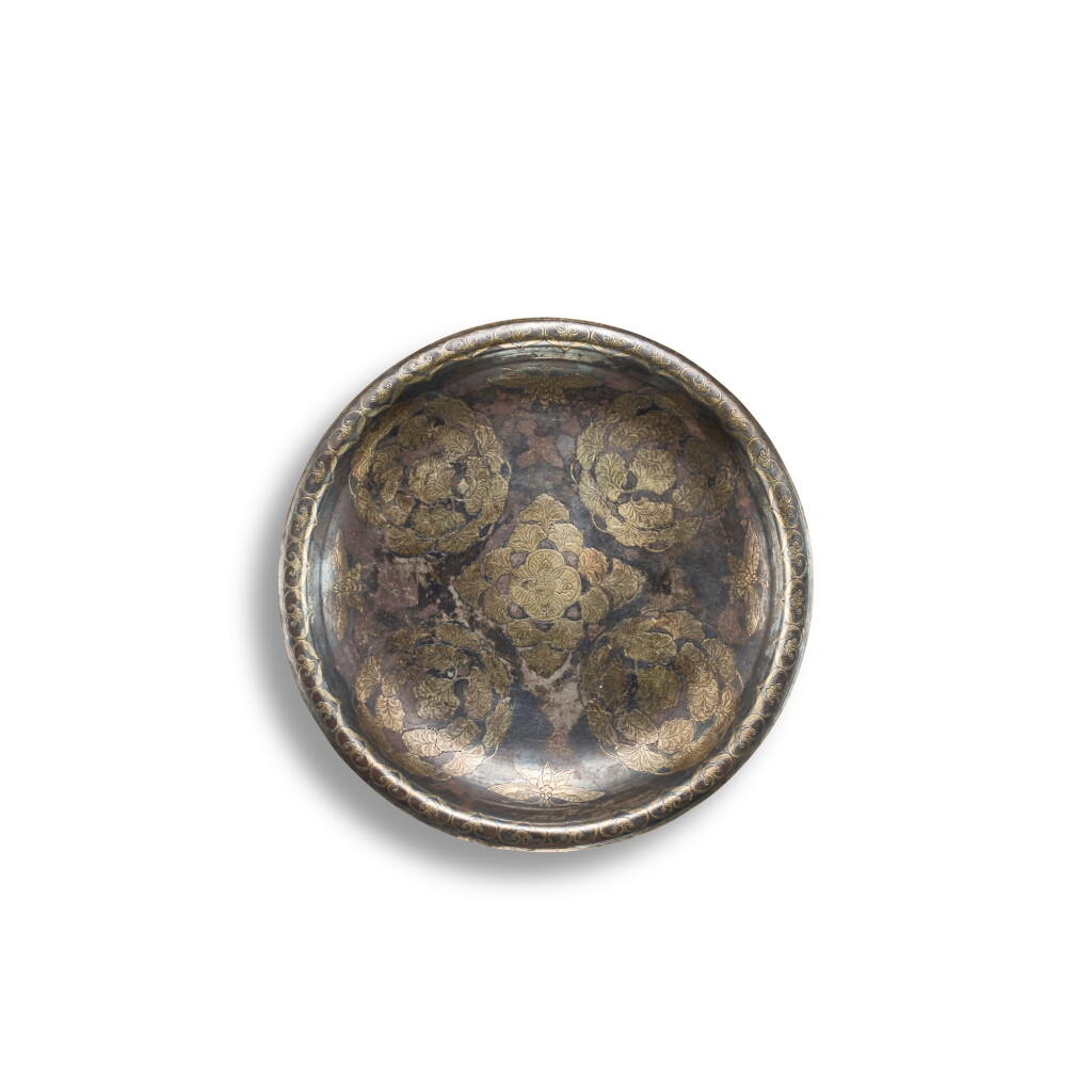 View full screen - View 1 of Lot 3609. A parcel-gilt silver 'floral' dish, Tang dynasty | 唐 銀局部鎏金團花紋盤.