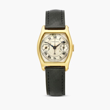 View full screen - View 1 of Lot 2485. Monopoussoir Tortue à Pattes | A very fine, rare and slim tonneau-form yellow gold single-button chronograph wristwatch with register and gold deployant buckle, Circa 1929.