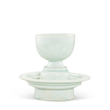 View full screen - View 1 of Lot 5012. A qingbai cup and cupstand, Northern Song dynasty 北宋 青白釉高足盃及盞托.