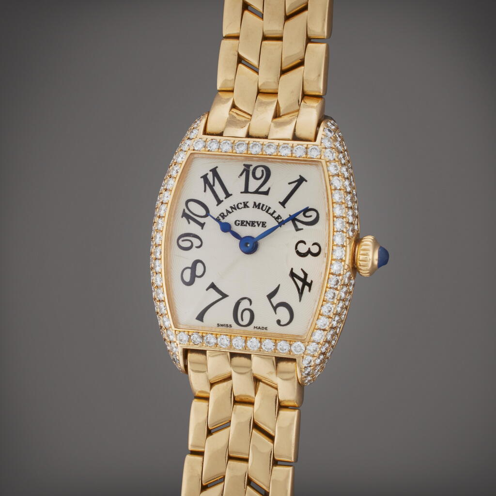 View full screen - View 1 of Lot 82. Reference 2251 MC D Cintree Curvex | A yellow gold and diamond-set wristwatch with bracelet, Circa 2000.