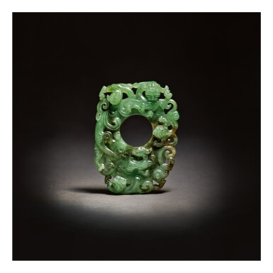 View full screen - View 1 of Lot 203. A SUPERB ARCHAISTIC SPINACH-GREEN JADE PENDANT, QING DYNASTY, QIANLONG PERIOD .