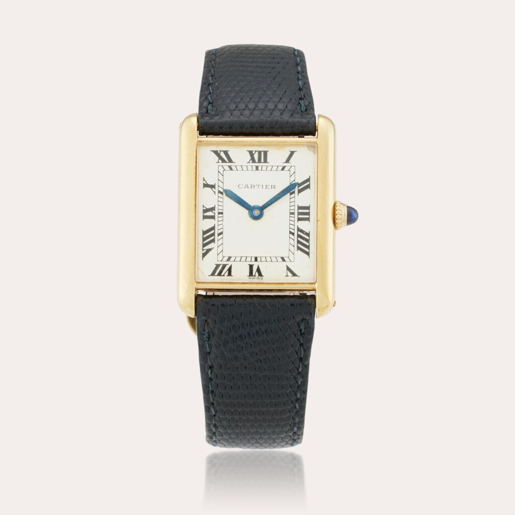 View full screen - View 1 of Lot 164. Tank Louis | A yellow gold wristwatch with a 'New York' stamped case back, Circa 1975.