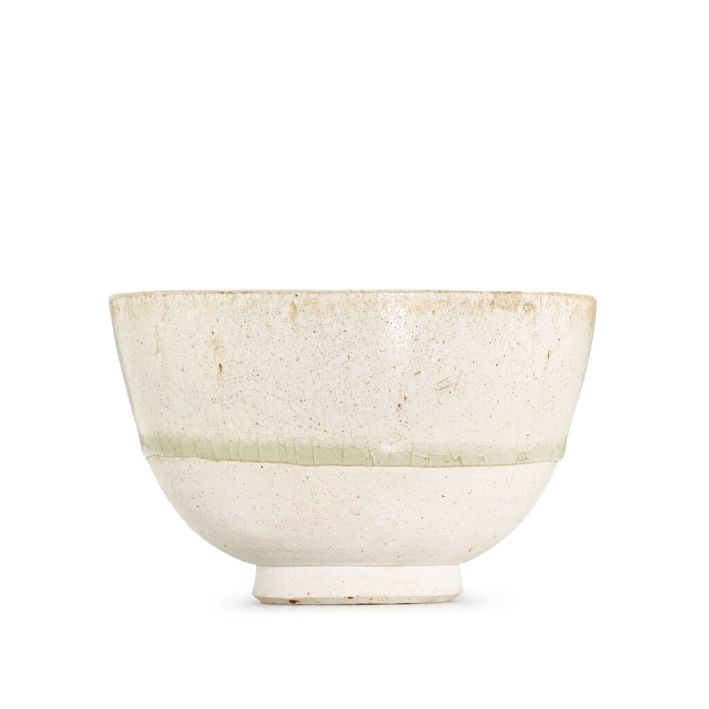 View full screen - View 1 of Lot 351. A transparent-glazed whiteware deep bowl, Sui - early Tang dynasty 隋至唐初 透明釉盌.