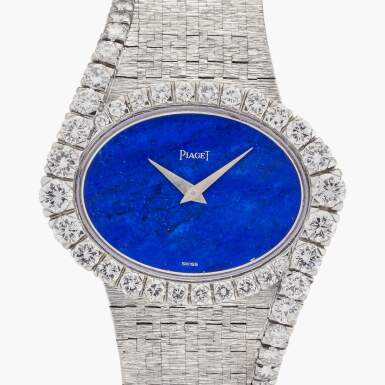 View full screen - View 1 of Lot 529. Reference 9857 A6 | A white gold and diamond-set bracelet watch with lapis lazuli dial, Circa 1970.