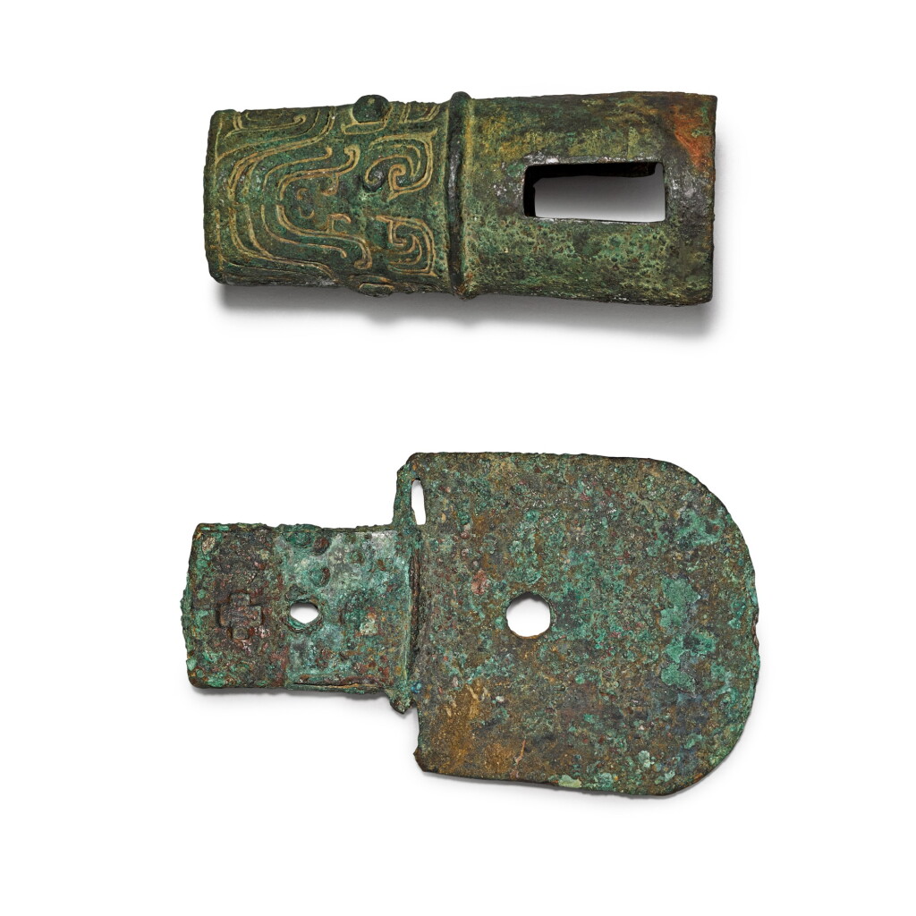 View full screen - View 1 of Lot 2. An archaic bronze axe and an archaic bronze chariot fitting Late Shang/early Western Zhou dynasty | 商末/西周初 青銅鉞及青銅車馬器 一組兩件.