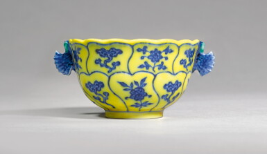 View full screen - View 1 of Lot 1. A RARE YELLOW-GROUND BLUE AND WHITE HANDLED CUP, YONGZHENG MARK AND PERIOD | 清雍正 黄地青花仙芝花卉紋雙耳盃 《大清雍正年製》款.
