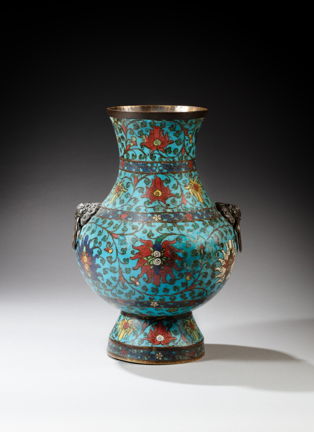 View full screen - View 1 of Lot 33. A cloisonné enamel ‘lotus’ hu-form vase, Ming dynasty, 16th / 17th century | 明十六 / 十七世紀 掐絲琺瑯纏枝番蓮紋鋪首耳活環壺.