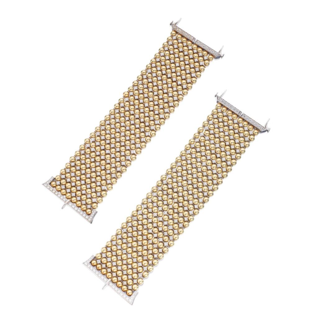 View full screen - View 1 of Lot 148. Pair of Gold and Diamond Bracelets.