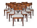 A set of twelve Regency mahogany and ebony 'Klismos' dining chairs, circa 1815, after a design by Thomas Hope