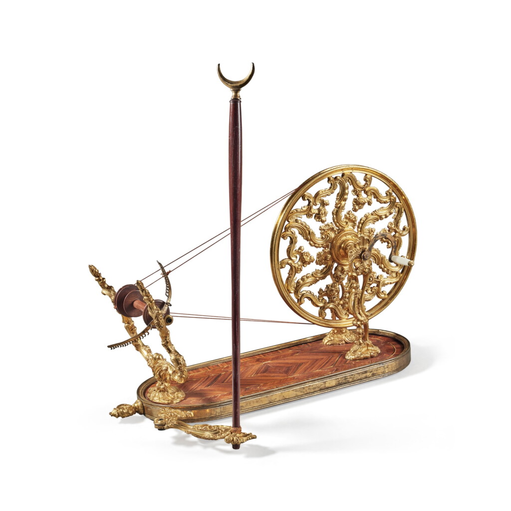 View full screen - View 1 of Lot 687. A Louis XV Gilt Bronze and Inlaid Tulipwood Rouet à Filer, mid-18th Century.