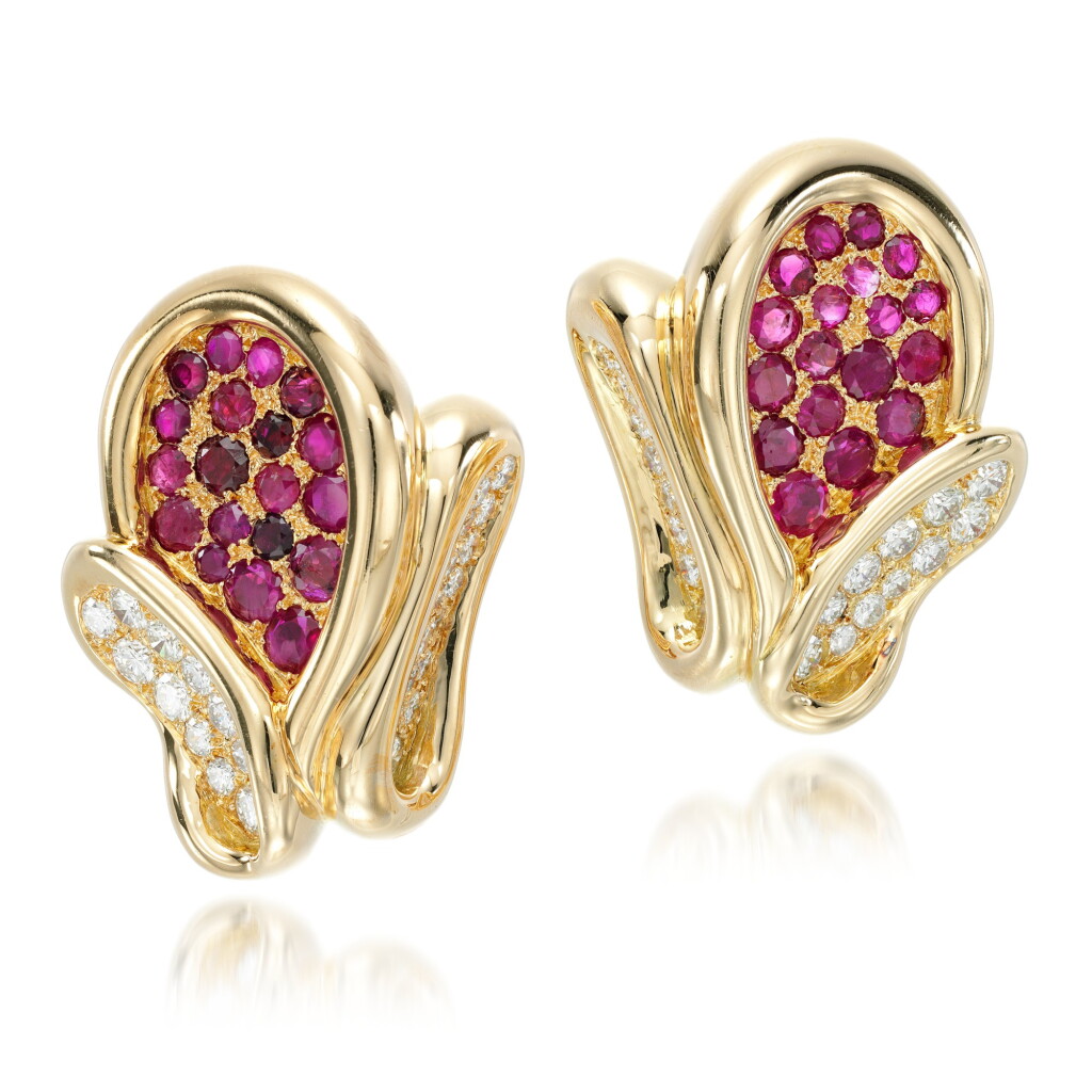 View full screen - View 1 of Lot 23. Pair of ruby and diamond ear clips, 1970s.