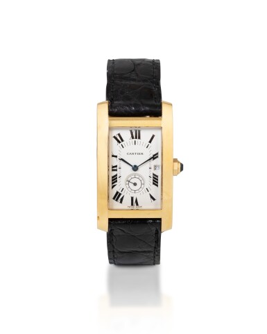 View full screen - View 1 of Lot 33. Cartier Tank Américaine, Ref. 8012905 Montre bracelet en or jaune avec date | Yellow gold wristwatch with date.
