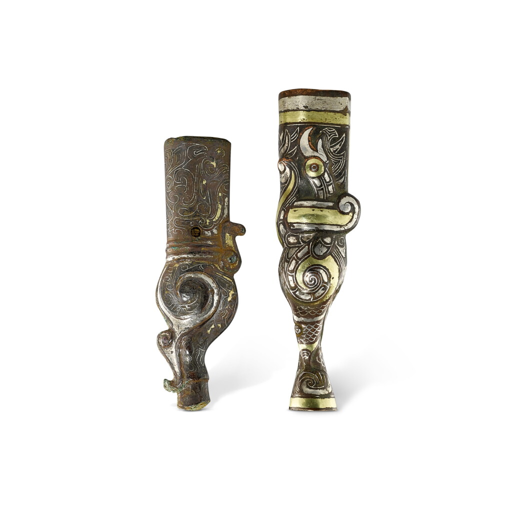 View full screen - View 1 of Lot 526. Two gold and silver-inlaid bronze 'phoenix' ferrules, Eastern Zhou dynasty, Warring States period 東周戰國 銅錯金銀獸形鳳紋鐏兩件.