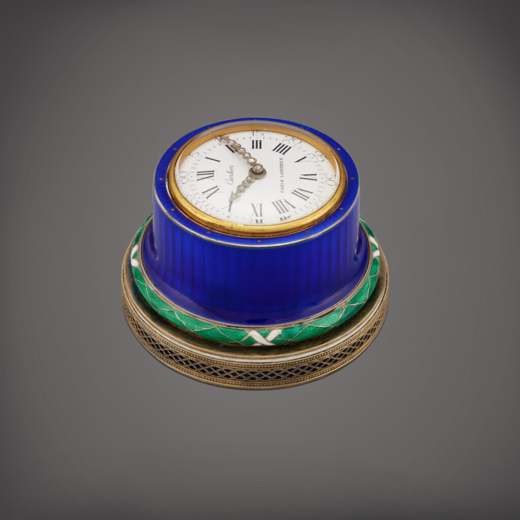 View full screen - View 1 of Lot 58. A silver and enamel bell push with timepiece, Circa 1909 | 卡地亞 銀及琺瑯按鈕時計,製作年份約 1909.