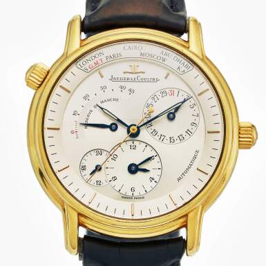 View full screen - View 1 of Lot 464. Reference 169.1.92 Géographique | A yellow gold automatic dual time zone wristwatch with date, 24-hour and power reserve indication, Circa 1990.