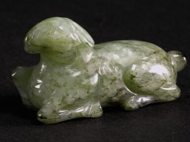 View full screen - View 1 of Lot 240. A SMALL MOTTLED JADE RAM PENDANT MING DYNASTY | 明 青玉臥羊.