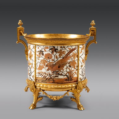View full screen - View 1 of Lot 462. A gilt-bronze mounted ivory and wood marquetry jardiniere by Ferdinand Duvinage and Alphonse Giroux, late 19th century | Jardinière en marqueterie d'ivoire et de bois, monture de bronze doré de la fin du XIXe siècle, par Ferdinand Duvinage et Alphonse Giroux.