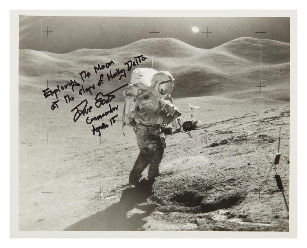 View full screen - View 1 of Lot 104. Apollo 15 EVA with camera, insc. by Scott.