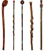 GROUP OF FIVE CARVED AND PAINT-DECORATED WOODEN WALKING STICKS, LATE 19TH CENTURY AND EARLY 20TH CENTURY