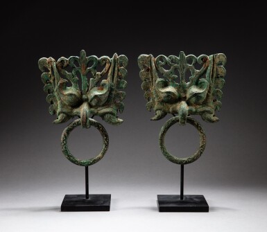 View full screen - View 1 of Lot 115. A pair of bronze 'taotie mask' ring handles, Six Dynasties period, 6th century | 六朝 六世紀 青銅鋪首銜環一對.