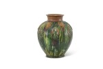 A sancai-glazed 'figural' jar Tang dynasty 唐 三彩人物圖罐