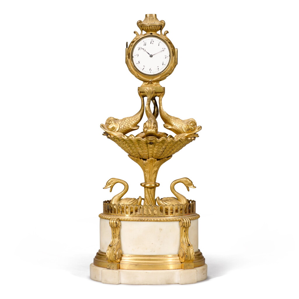 View full screen - View 1 of Lot 59. A Regency gilt-bronze and white marble watch stand, 19th century.