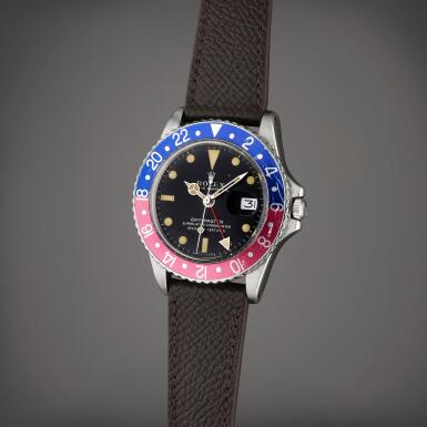 View full screen - View 1 of Lot 38. Reference 1675 GMT-Master 'Fuschia' | A stainless steel automatic dual time wristwatch with date, Circa 1962.