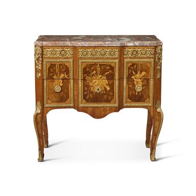 View full screen - View 1 of Lot 670. A Louis XV/Louis XVI Transitional Gilt-Bronze Mounted Tulipwood, Sycamore and Marquetry Commode, Circa 1770.