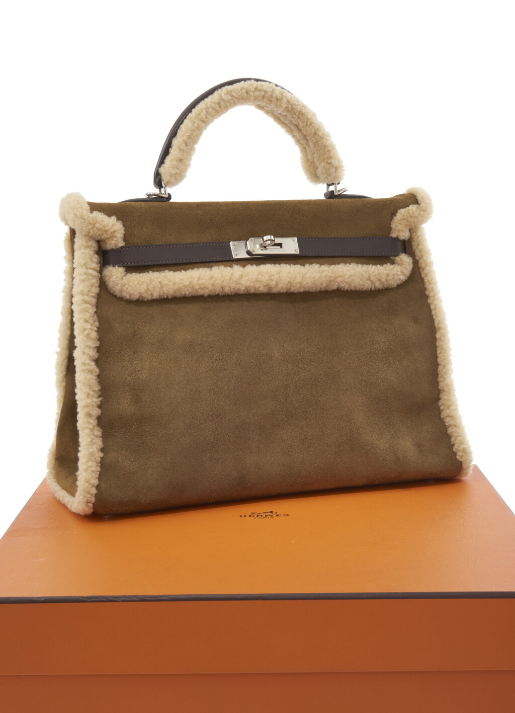 View full screen - View 1 of Lot 42. Shearling and brown calf box leather with palladium hardware, 'Teddy Kelly' limited edition, Hermès, 2005.