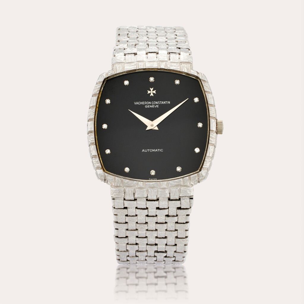 View full screen - View 1 of Lot 380. Reference 7391 Q | A white gold and diamond-set cushion shaped bracelet watch with onyx dial, Circa 1980.
