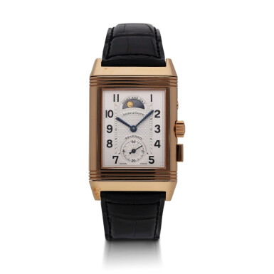 View full screen - View 1 of Lot 406. Reference 270.2.58 Reverso Geographique | A limited edition pink gold dual time reversible wristwatch with moon phases, power reserve, and day/night indication, Circa 1999.