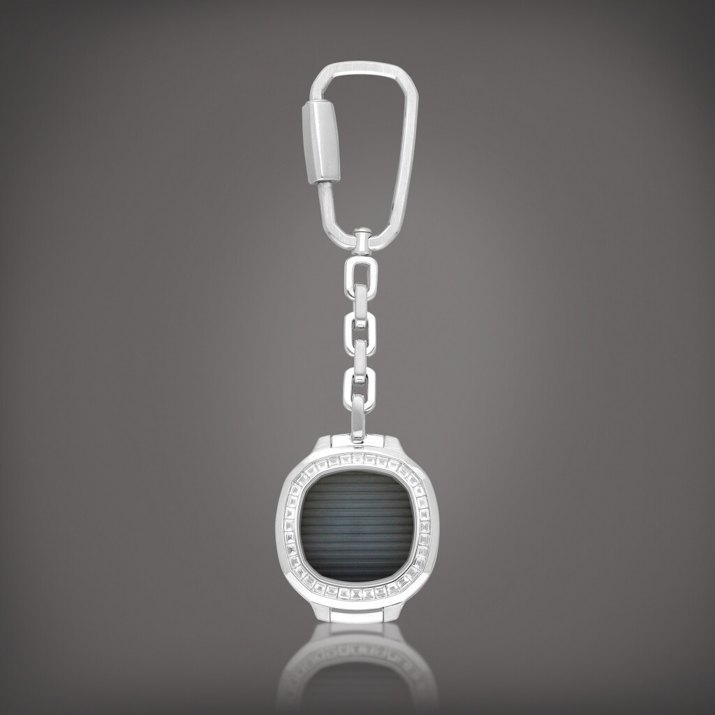 View full screen - View 1 of Lot 2225. Nautilus | A white gold and diamond-set keychain, Circa 2016 | 百達翡麗 | Nautilus | 白金鑲鑽石鑰匙扣,約2016年製.