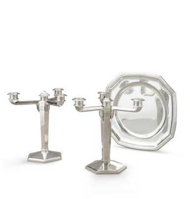 View full screen - View 1 of Lot 30. A pair of 3-light silver candelabra, Christofle, and a silver dish, Tétard, both Paris, circa 1930 | Paire de chandeliers à 3 lumières en argent, Christofle, et plat en argent, Tétard, les 2 Paris, vers 1930.