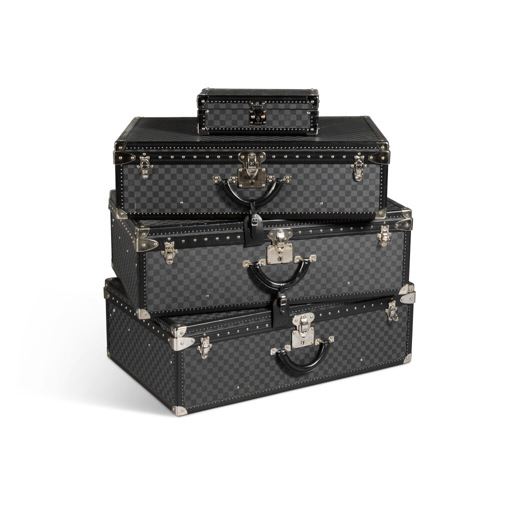 View full screen - View 1 of Lot 135. Set of Four: Damier Graphite Canvas Trunks and Watch Trunk, 21st Century.