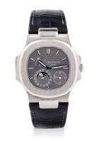 PATEK PHILLIPE | NAUTILUS, REF 5712 WHITE GOLD WRISTWATCH WITH DATE, MOON PHASES AND POWER RESERVE INDICATION CIRCA 2016