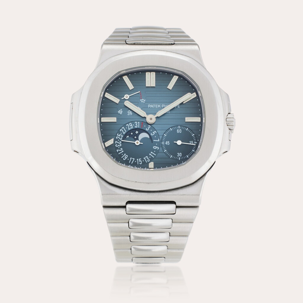 View full screen - View 1 of Lot 146. Reference 5712/1A-001 Nautilus | A stainless steel automatic wristwatch with date, moon phases, power reserve indication, and bracelet, Circa 2008.
