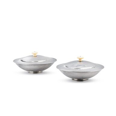 View full screen - View 1 of Lot 91. A pair of silver and ivory covered entree-dishes designed by Oscar Gundlach Pedersen for Georg Jensen, Copenhagen, circa 1925-1930 | Paire de légumiers couverts en argent et ivoire modèle d'Oscar Gundlach Pedersen pour Georg Jensen, Copenhague, vers 1925-1930.