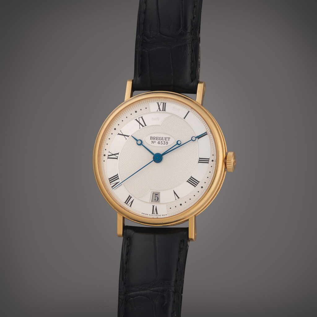 View full screen - View 1 of Lot 636. Reference 5187BA/15/986 Classique | A yellow gold automatic wristwatch with date, Circa 2011.