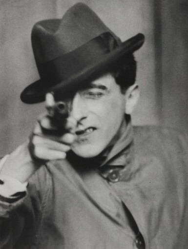 View full screen - View 1 of Lot 60. Jean Cocteau with Gun, Paris.
