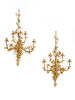 A Pair of Italian Rococo Style Gilt Composition Five-Branch Wall Lights