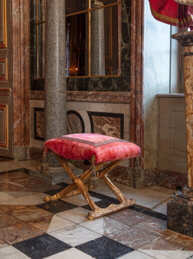 View full screen - View 1 of Lot 5. A giltwood stool, after a model by Marc Vibert or Michel Poncet, Italy, Parma, circa 1750, delivered to Madame Elisabeth, duchess of Parma for the Colorno Palace | Ployant en bois doré d’époque Louis XV, Italie, Parme d'après un modèle de Marc Vibert ou Michel Poncet, vers 1750, livré à Madame Elisabeth, duchesse de Parme au Palais de Colorno.